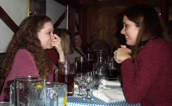 Foster and Demmert's sister laugh about something-or-other