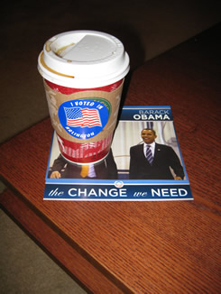 Voter coffee with political pamphlet